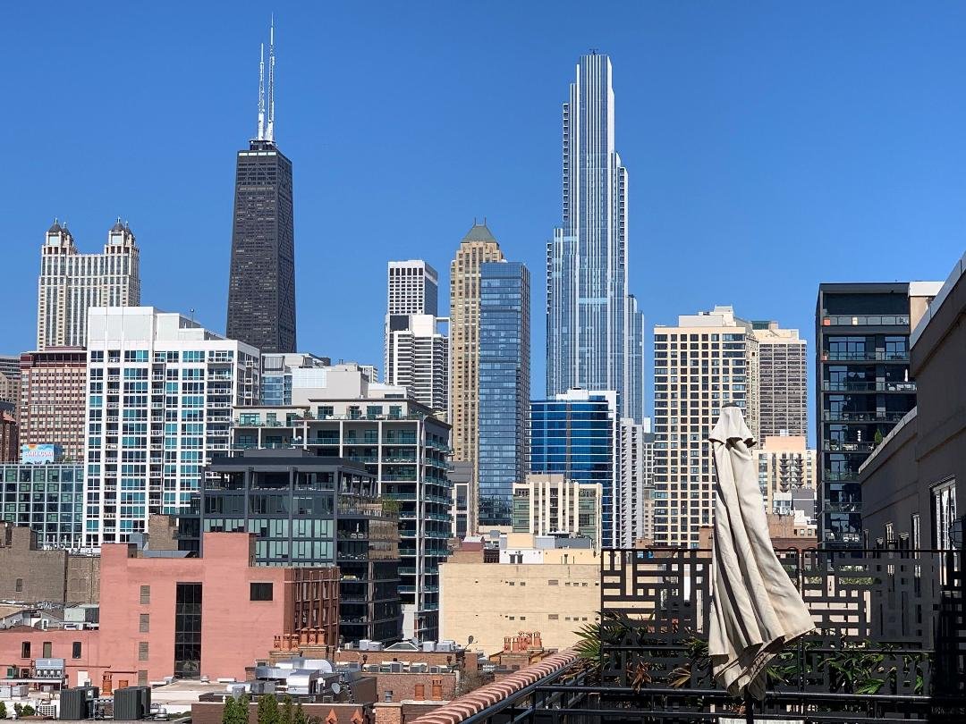 Caught this view of the 875 North Michigan (fka John Hancock Center) and the new One Chicago building, the two tallest buildings in the photo. The sun accentuates the profile of One Chicago.
