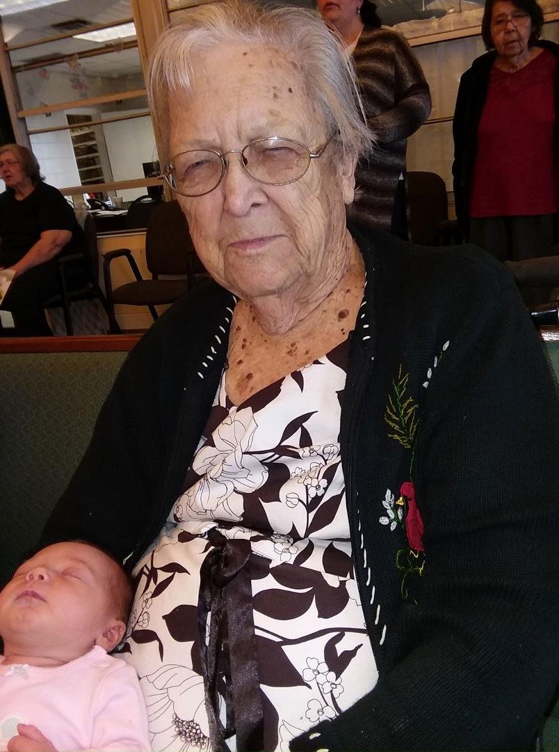 Mom with her newest great-great granddaughter.