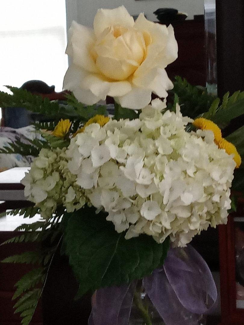 Thank you to the Flower Team at Bethany United Methodist Church for sharing this beautiful flower arrangement with me & for my neighbor friend Carol Williams for bringing it. The rose was added from my garden.
"These flowe