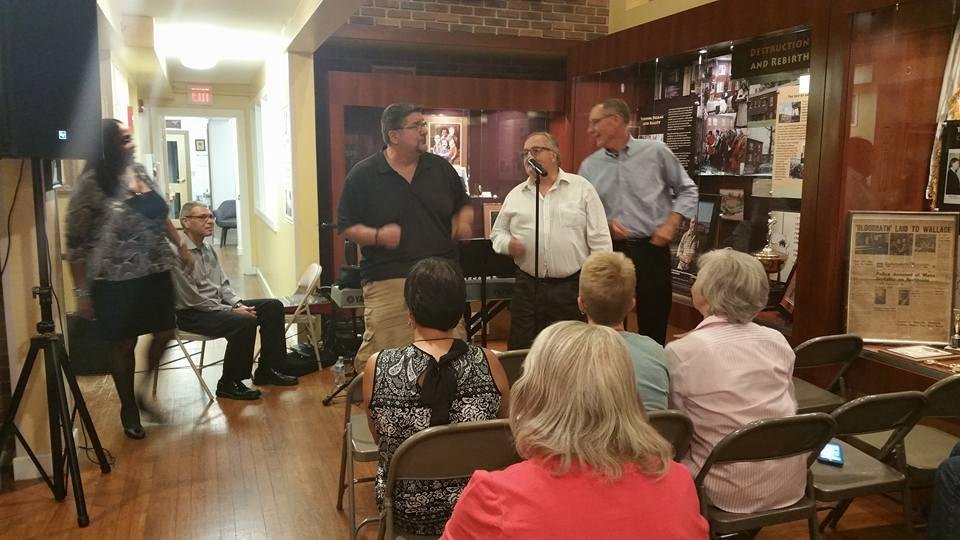Crowd enjoying the extra entertainment with Gina Moore and Warren Hale at the Evansville African American Museum Jazzy Night!