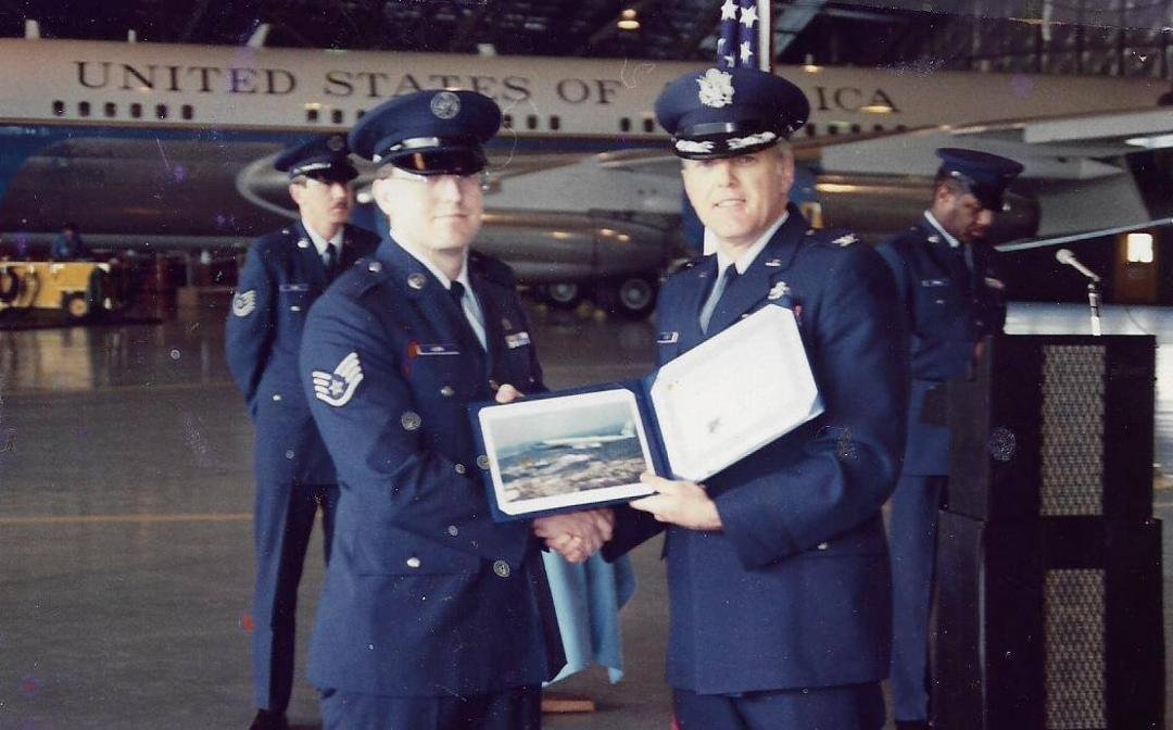 This picture was sent to me by MGEN(ret) Duane Jones who worked for me as a Squadron Commander at Andrews AFB, MD. The picture was entitled " The Good Old Days" I was making a presentation to on of the NCO's in the aircraf