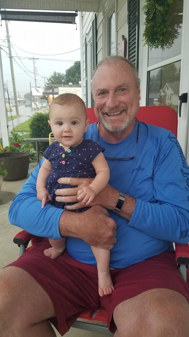 On the front porch with Cambrie just watching it rain.