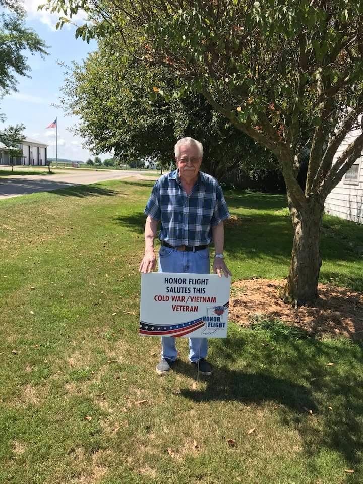 Don Shaffer with his Honor Flight sign.