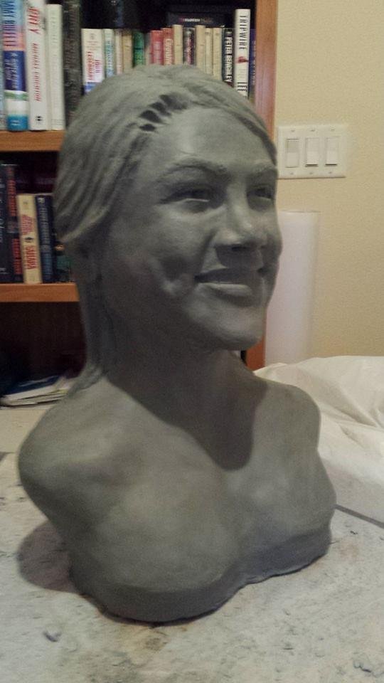 It is getting close. I had to use a guitar string and slice it into five sections and hollow it out, then put it back together. I removed about 15 pounds of clay. The drying process will take three to four weeks and then be