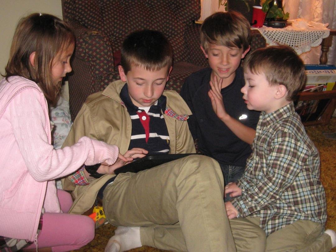Four grandkids, one Ipad.