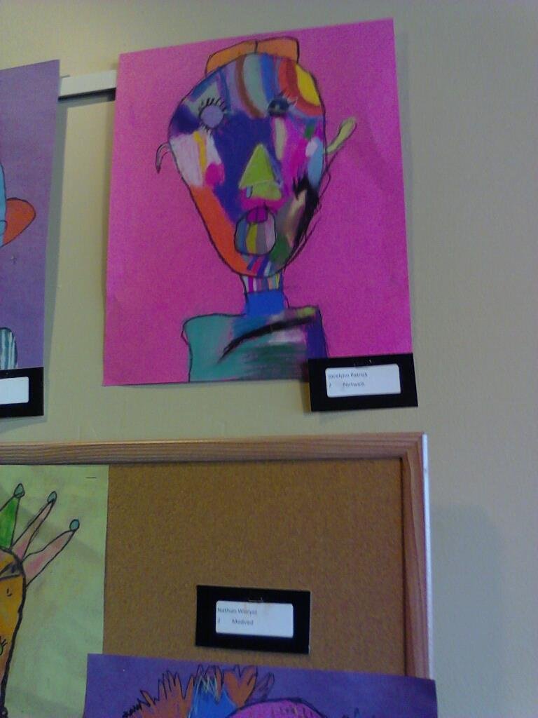 Jocelynn's picture hanging up at starbucks on wadsworth and jewel. And it has snot dripping and it's drooling