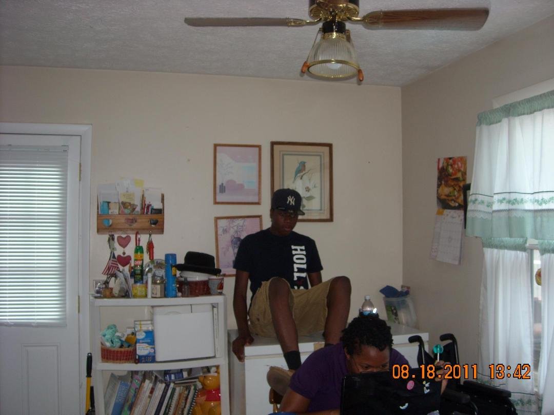 Gregory with Sheneil trying to hide!