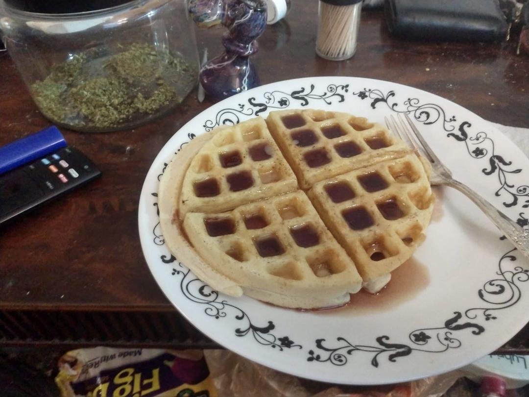 For breakfast this morning fresh waffle boysenberry syrup and a  nice packed bowl