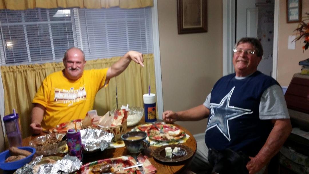 Friendly  brother in law rivalry.  Lovin Georges home made  Dallas shirt!