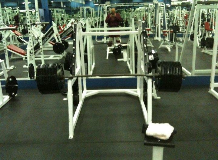 My Deadlifts and Shrugs Bar with 8 Bills on it.
