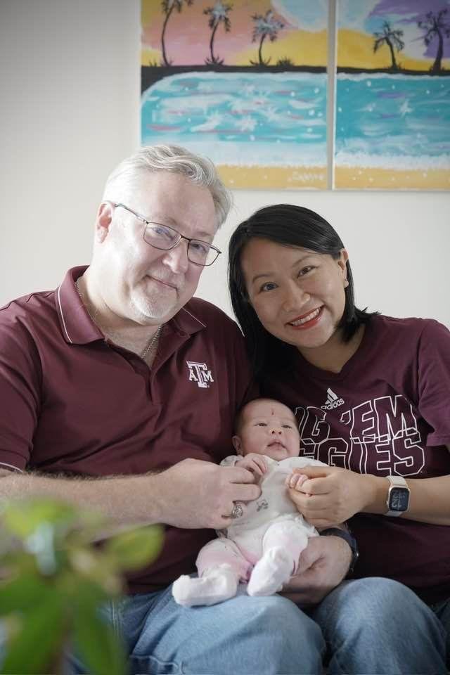 This is son Jeff with his wife, Rachel and new little Angel, Miss Athena Li Xios Downey.