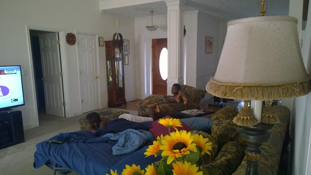 Two guest bedrooms but these visiting grandsons prefers the living room pull-out sofa. ???