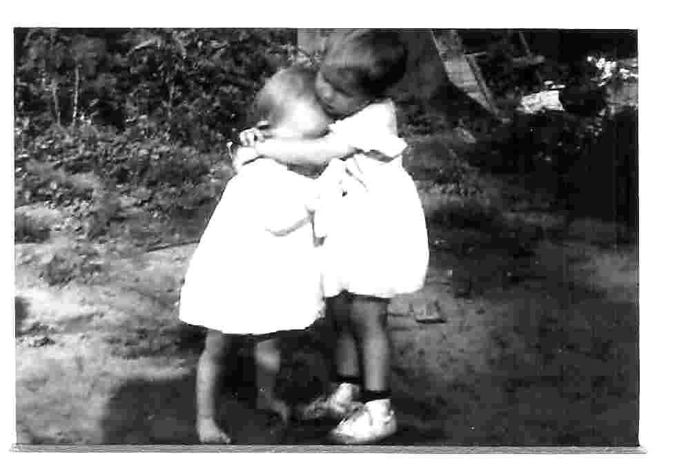 Two loving sisters, Leah (Herzog) and Norma (Oxley) Falatine. Note that Leah is wearing no shoes. I think it wasn't her day to wear the pair we shared. (Kidding, we were poor, but we each had shoes, Praise God). She was