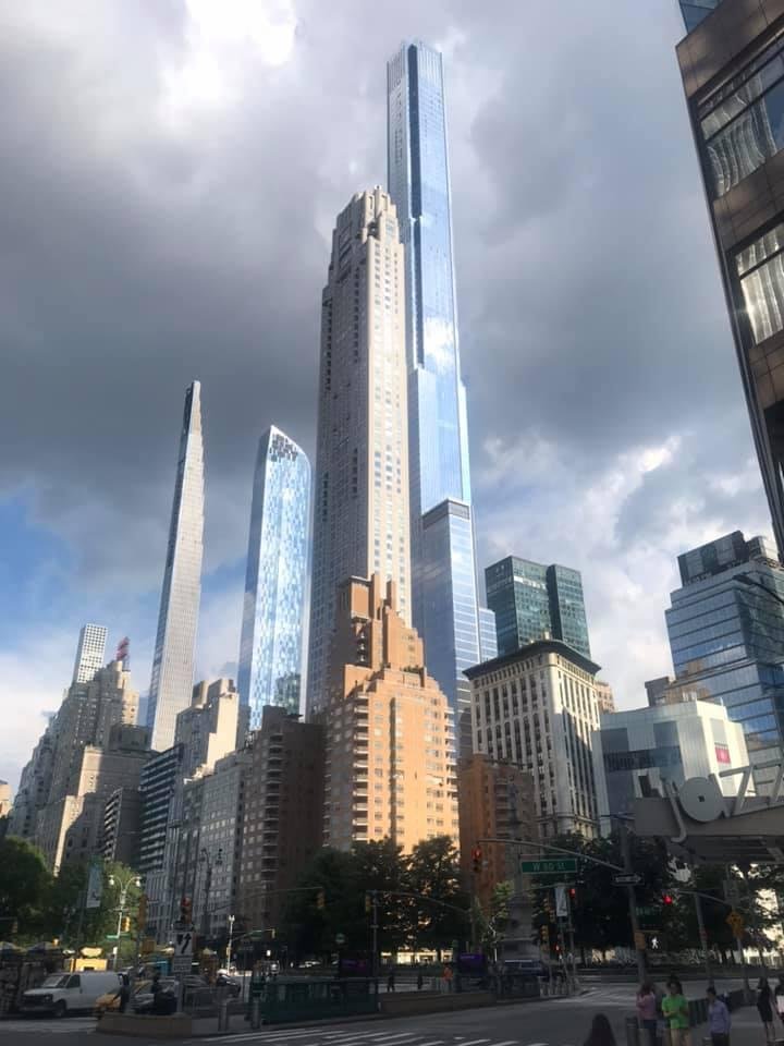 From Columbus Circle looking at the new towers in back of Central Park South. Surreal!