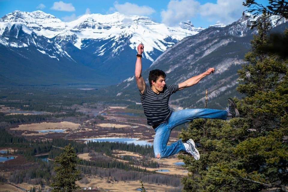 I rarely put pictures on my facebook but had to include this picture of our oldest grandson, Aidan, jumping at Banff, Alberta. Great shot.