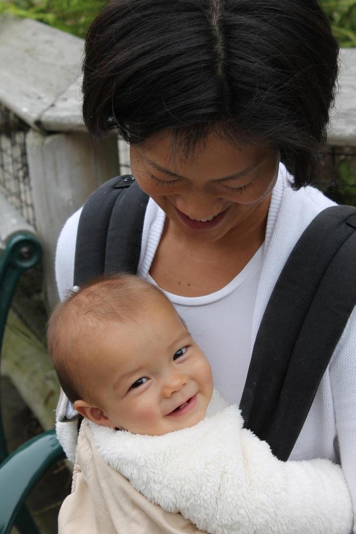 Baby Nina flashing a smile at Grandma Susie