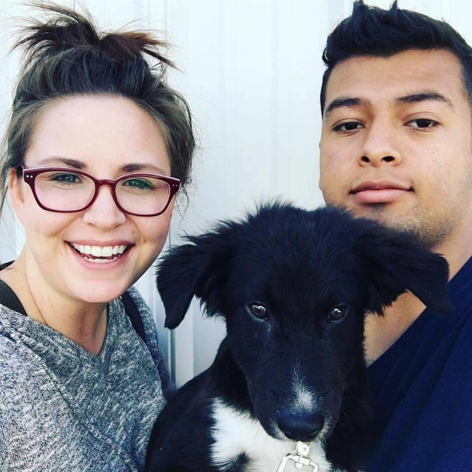 Kristen and Alexis with their rescue puppy.