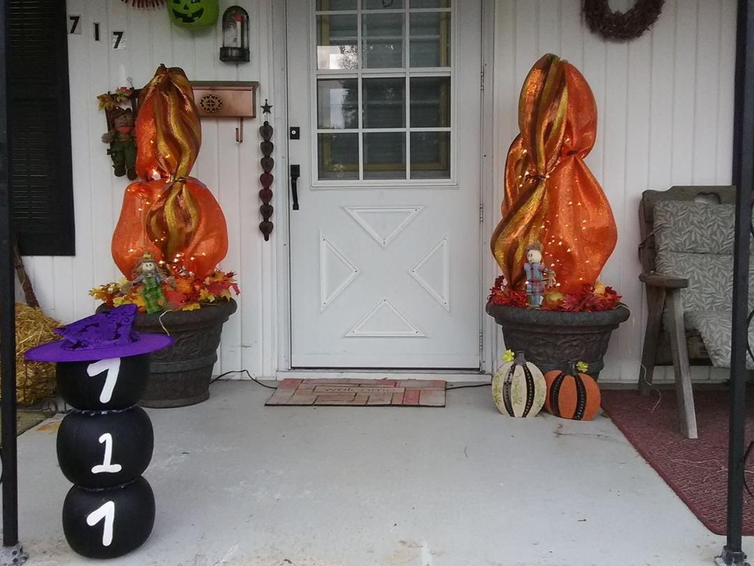 Got the porch ready for fall. But I had a little helper name Skylar.