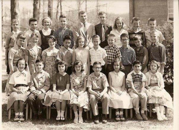 Melvin Dann's 6th Grade Class - Lynnbrook Elementary
Top Row: Left to Right: Tina Bradley, Robert Ziehl, Irene Saal, Miles White, Mr. Dann, David Maryott, Sonya Wettergreen, John Rosenberger, and Barry Coyle.
Middle Row