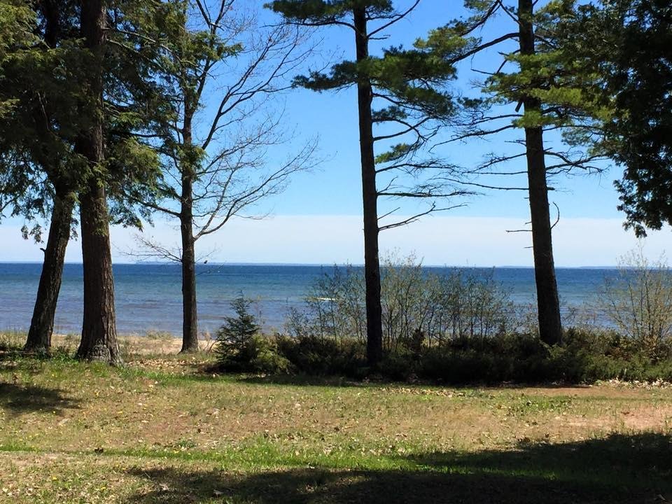 On the way to plant corn with customer in The U P Michigan and had to stop at roadside/lake camping site on Lake Michigan.