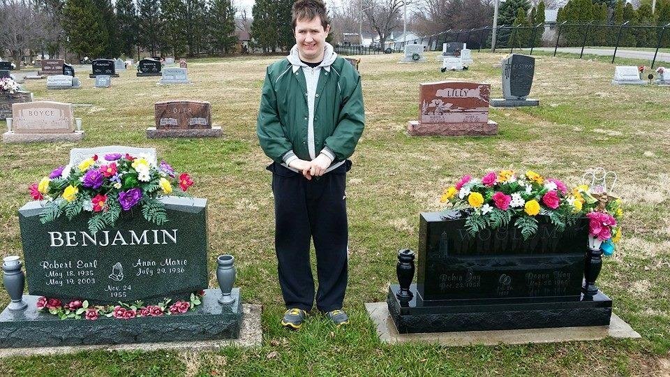 This is a picture of me with my mom Donna Benjamin Woolum and my Grandpa Benjamin and we just put new flowers on them. :)