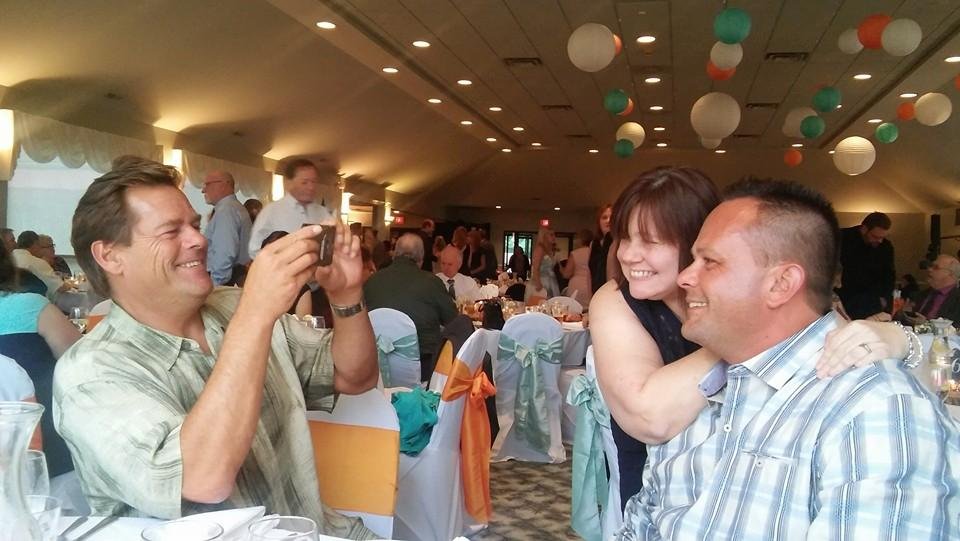 Uncle Rob taking a piture of Lana and Andrew too good of a picture to pass up