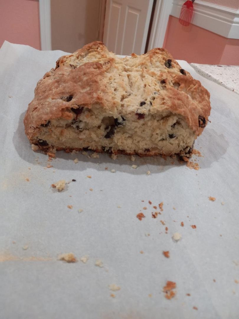 A warm piece already consumed with butter.