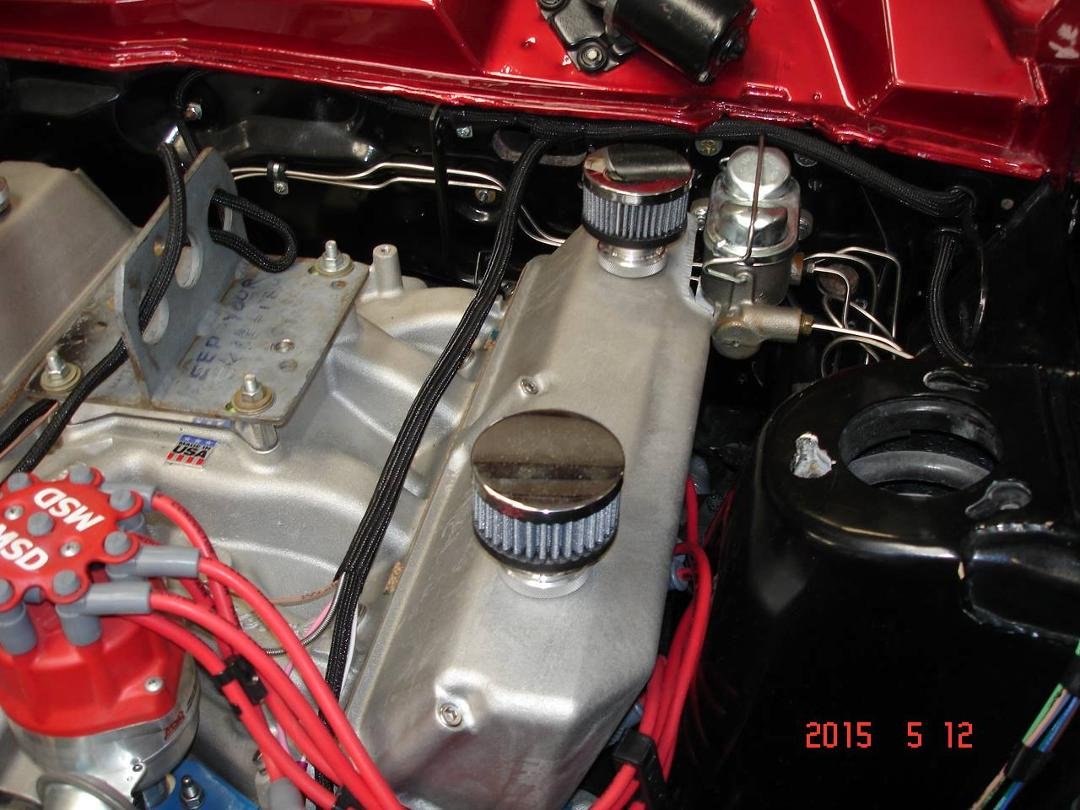 The Blue Thunder covers are so tall that we had to notch the rear corner of the valve cover for everything to fit.
