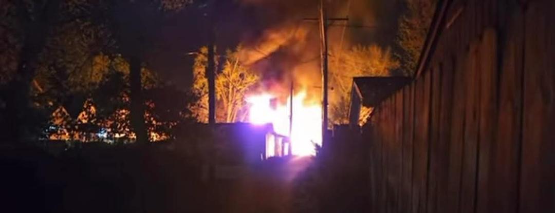The back end of the garage on the left is our garage, the fire was 3 or 4 houses down the alley from us!