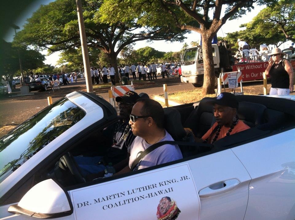 He was in the Grand Marshall car in the parade.