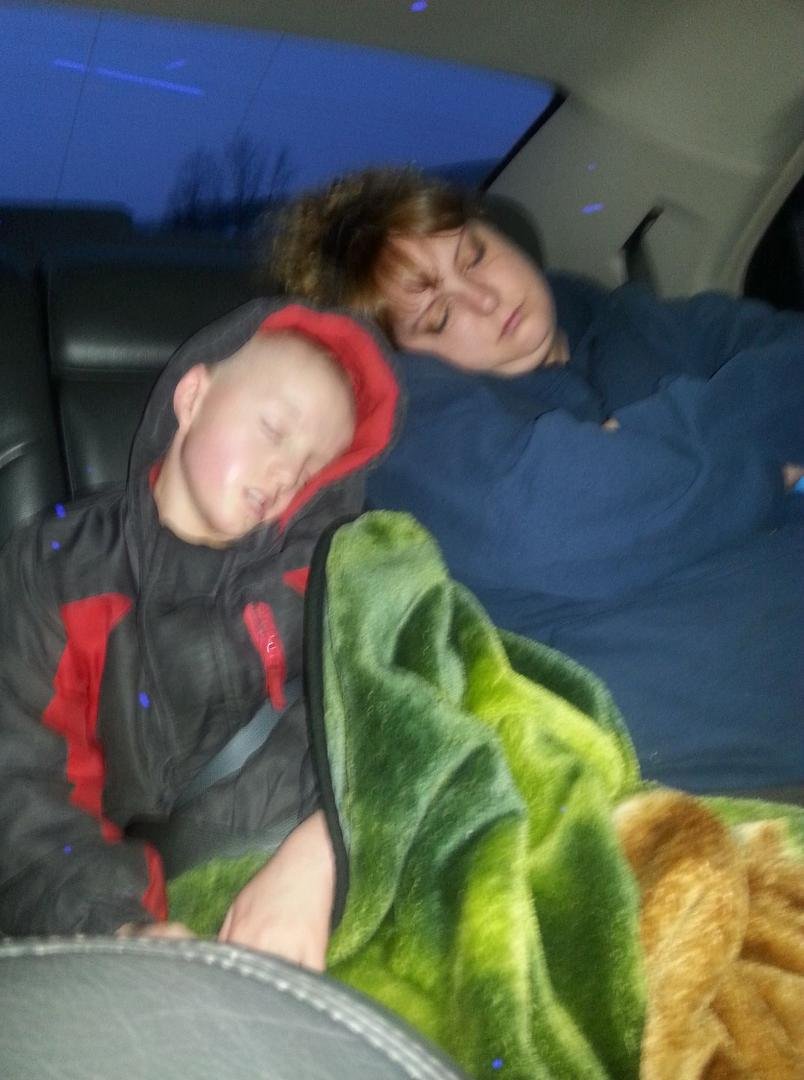 Kace and Sherry TadderTrader crashed in the back seat