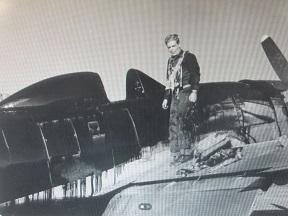 1st Lt. Edwin King returning from mission over Italy, 1945, his P-47 and flight suit covered in oil from flak damaged engine. He was KIA on a later mission.