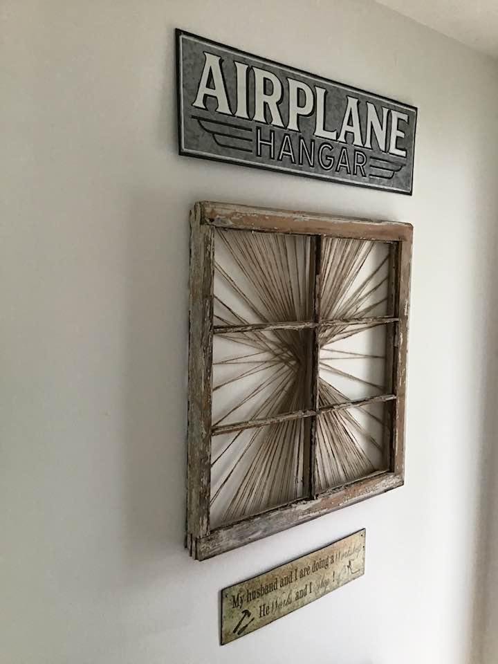 Here’s my old window frame added a little twine and hung on the wall.