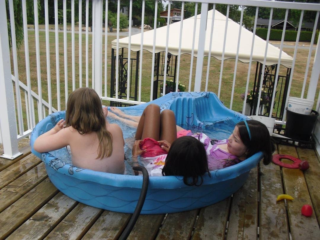 It's not how big the pool is...........it's the company you keep.  Not only that the water has to bathtub hot.  Fun day with the grandkids.