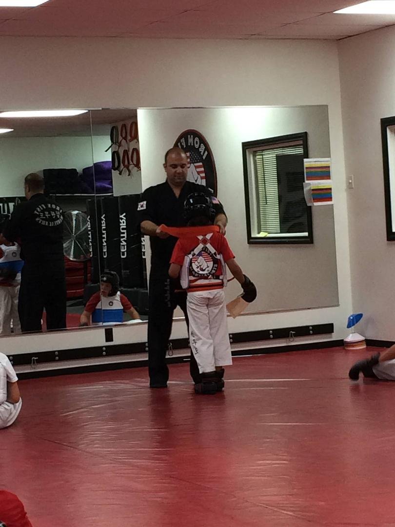 Alex sparing & then getting a new belt.... Orange with Black