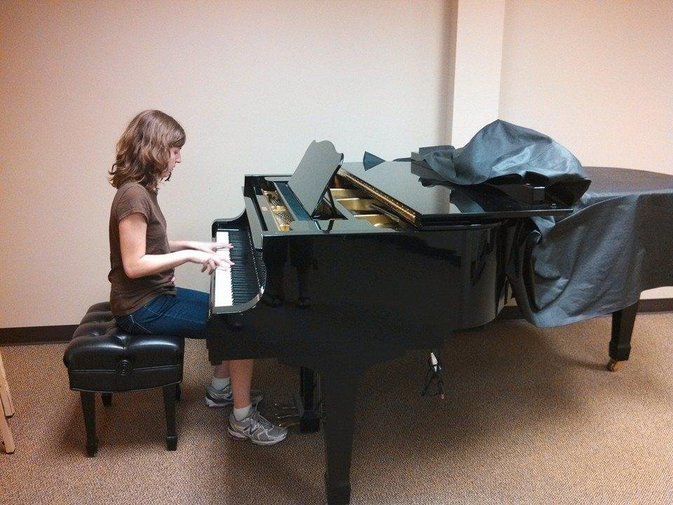 Katie Bossert playing on the piano that Elton John played on.