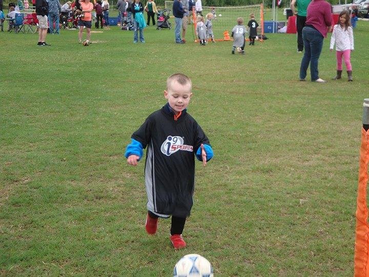 Grandson Silas warming up for his 1st soccer game