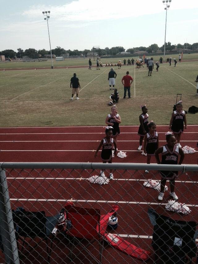 At Kirsten's first cheerleading game of the year. Go Jacks!