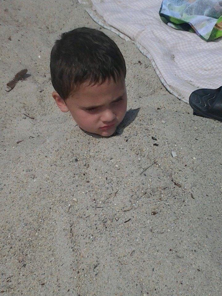 AJ loved the sand at the beach