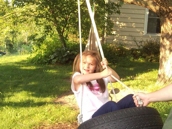 Kat on the tire swing