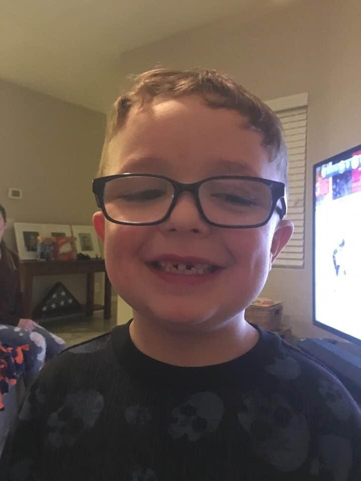 Grandson Cannon just pulled his tooth out.
