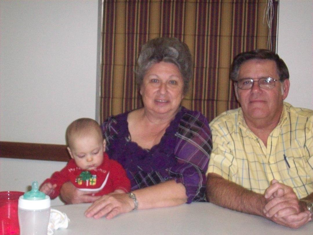 100_1104.jpg  Andrew with his great, great Aunt Sherry &gg Uncle Don.
