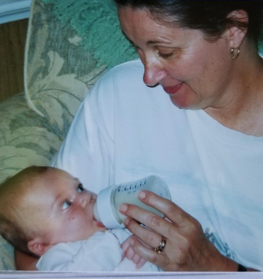 Happy Birthday Michael. Came across this picture of your Grandma Diane holding you...so sweet!