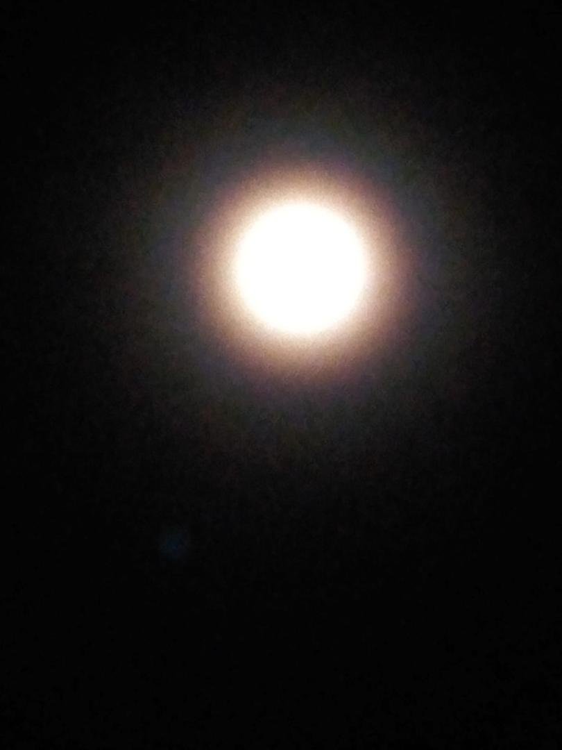 The moon has a ring around it tonight and it's really bright.