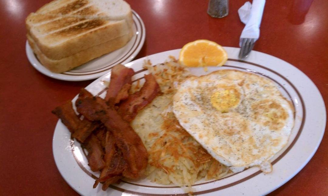 14" long plate 6 slices thick bacon texas sourdough 3 ex lg eggs O.H. & blazing hot taters. I usually eat the 2nd half of my dinner for breakfast.