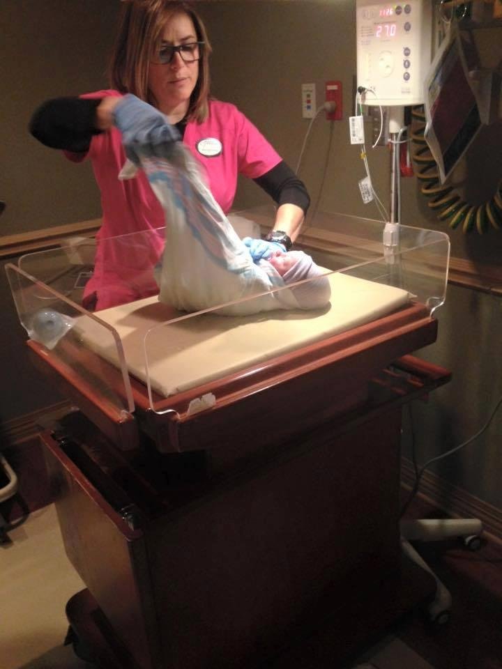 My nurse and I getting ready to meet Mommy