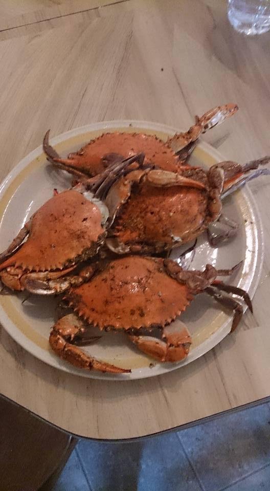 Trying to put a dent in the half bushel of Maryland blue crabs that Jessica Wright Tilles picked up. It's a tradition when ever the sisters<3 get together.