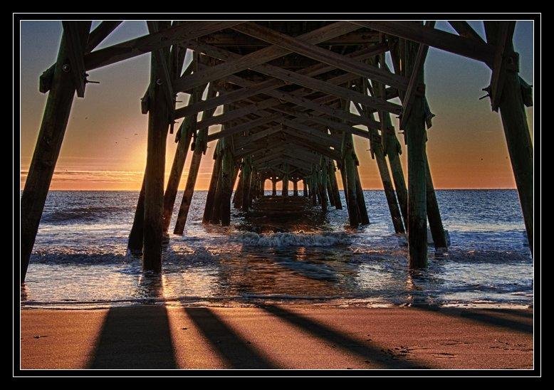The dawn broke cold and clear at Surfside Beach this morning. Took this shot, then jogged for 45 minutes, threw the ball on the beach with Suzy, then drank copious quantities of hot coffee.