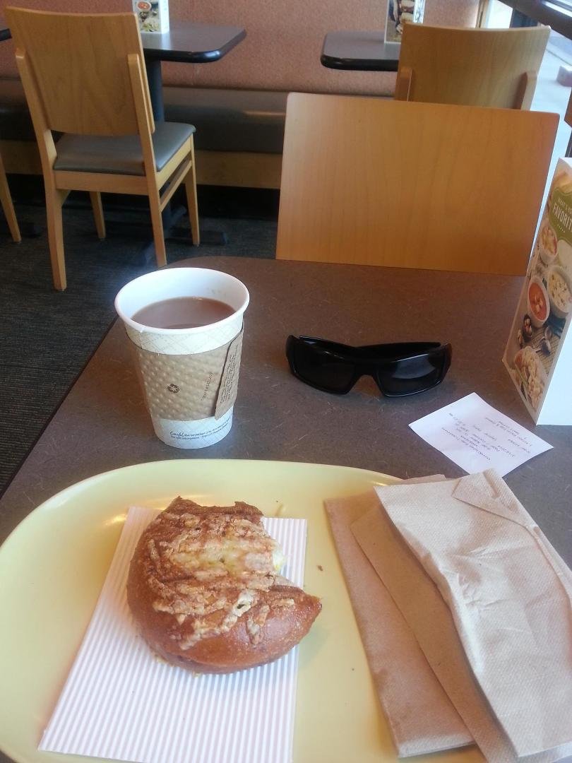 Enjoying a delicious breakfast sandwich and free Wi-Fi