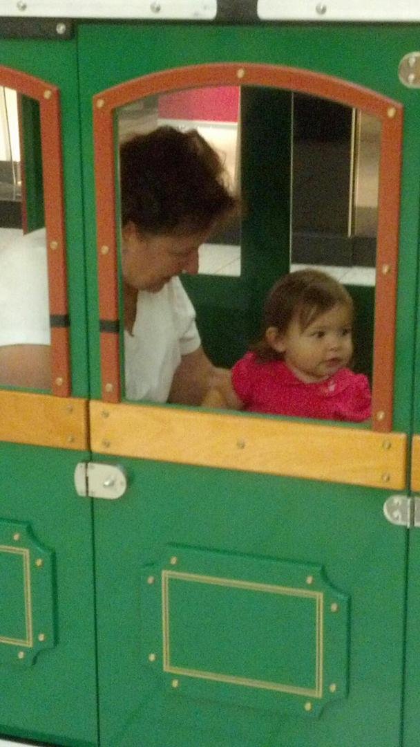 Alina enjoying her first train ride with Buni.